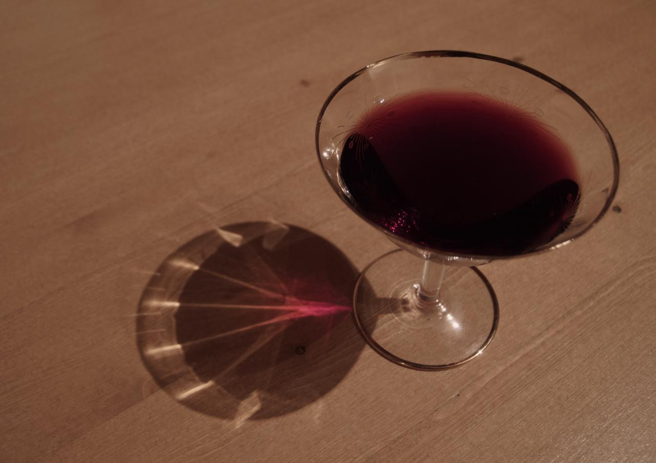Glass of red wine on a wooden table | Free Images For Commercial Use Glass of red wine on a wooden table | Free Images For Commercial Use