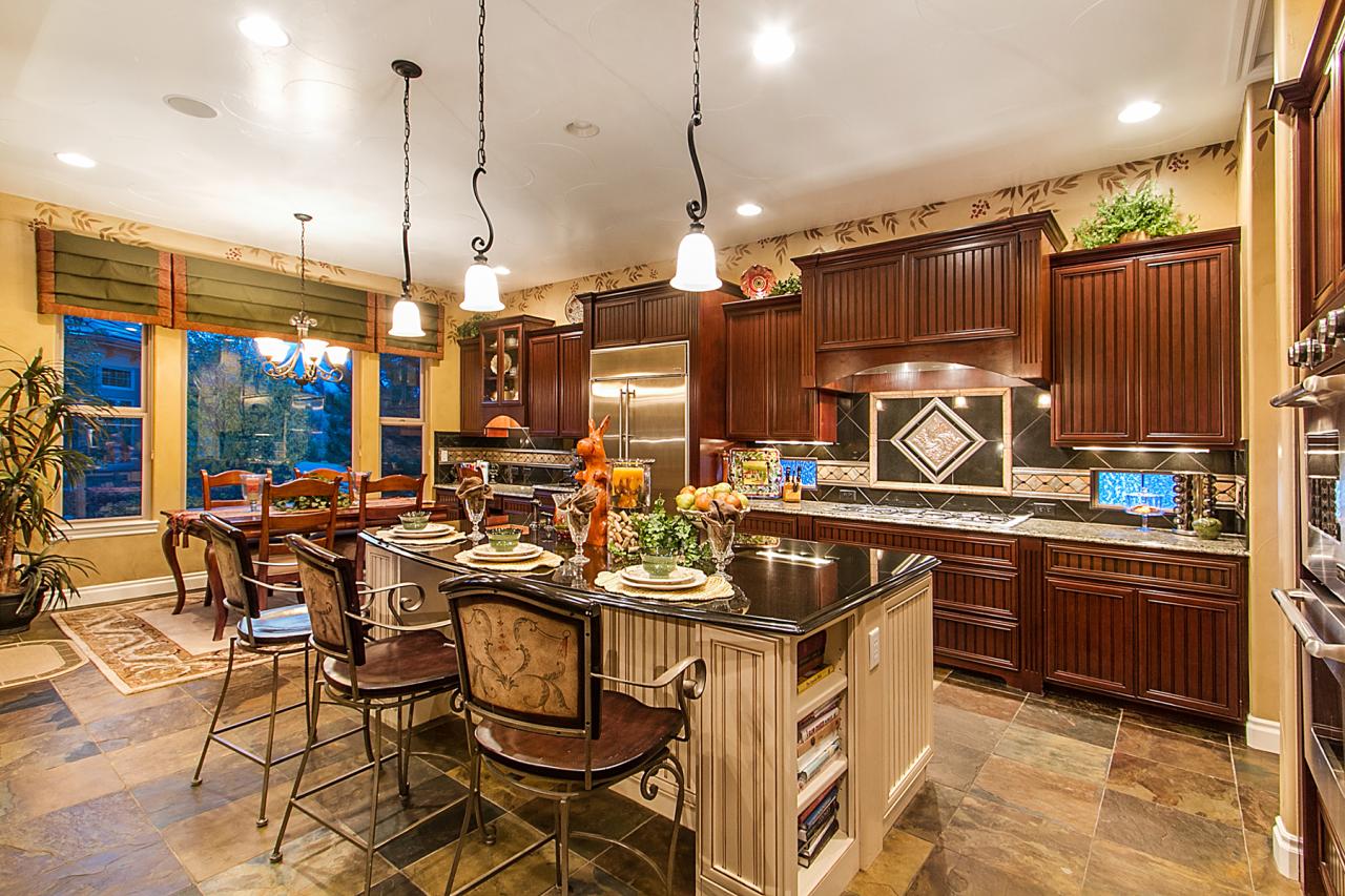 Modular U-Shaped Kitchen Design With A Black Granite Countertop | Livspace Modular U-Shaped Kitchen Design With A Black Granite Countertop | Livspace